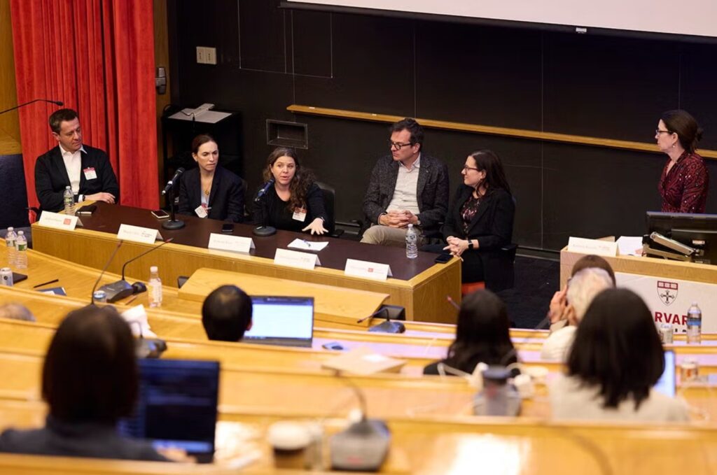 Harvard T.H. Chan School of Public Health's Kresge G-1 auditorium with engaged audience.