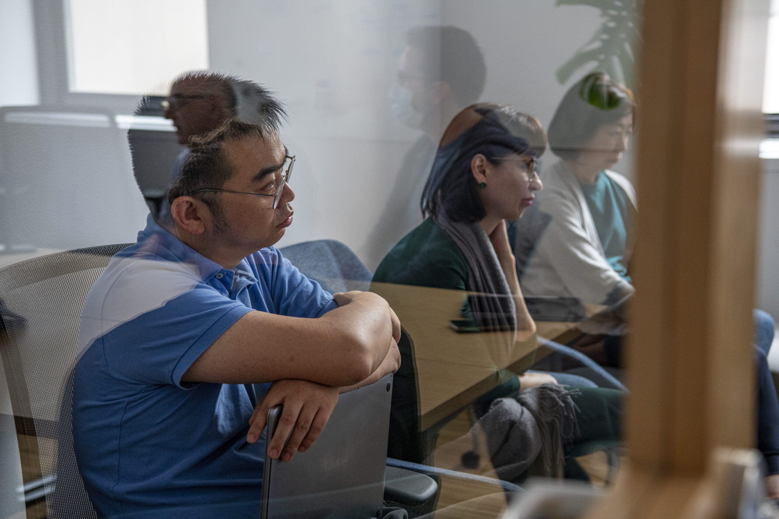 Three Rubin lab members participating in a meeting.