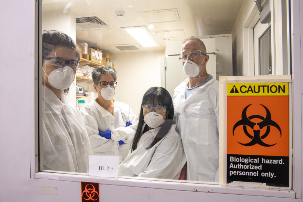 Kanki Lab members wearing lab personal protective equipment