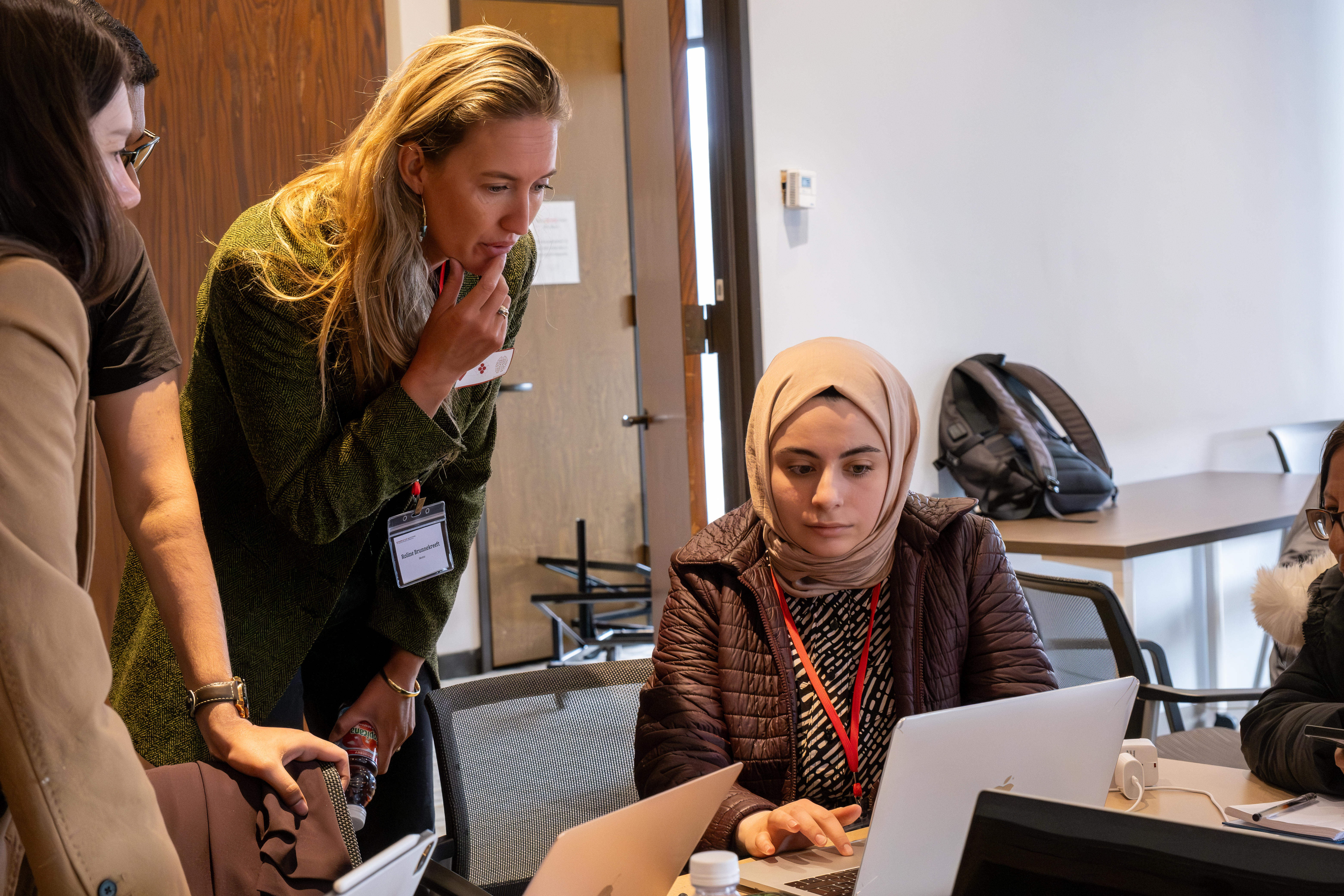 An HSIL professor teaching a student