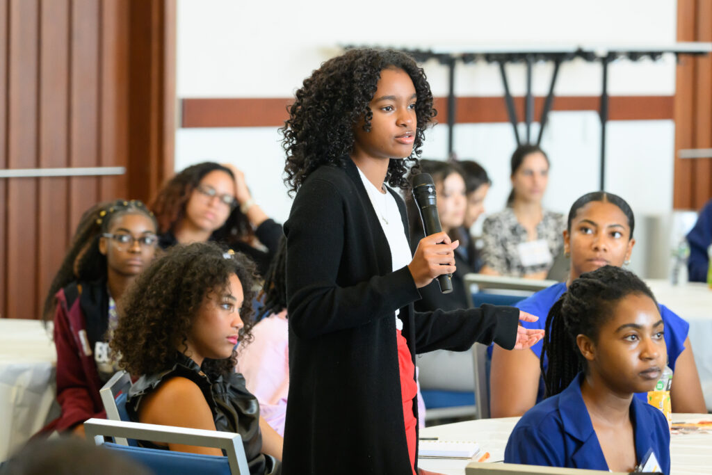 audience member asks a question at event