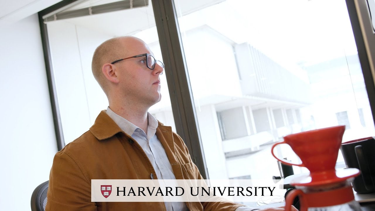 Video Thumbnail image of Jeff Imai-Eaton working at his computer against a window backdrop.
