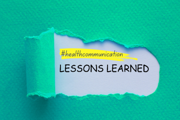 Peeling paper with text underneath reading #healthcommunication lessons learned
