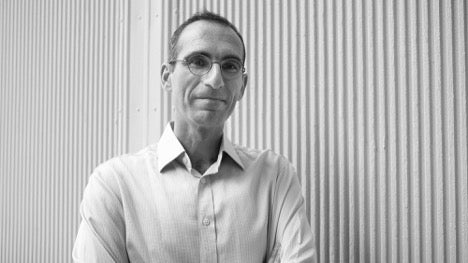 Headshot of Yonatan Grad