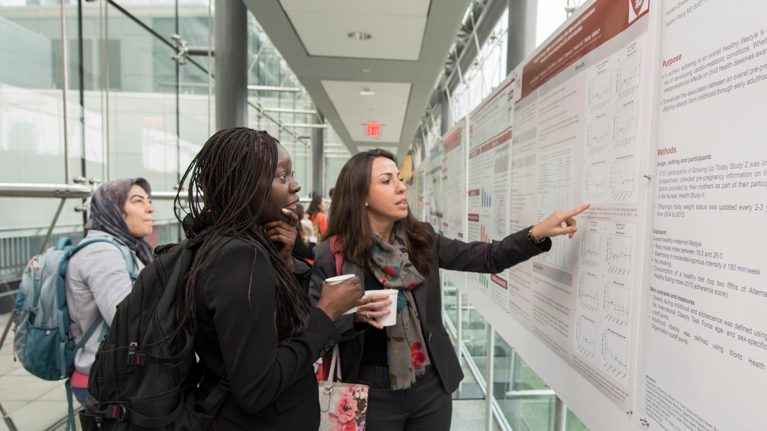 Postdoctoral students at a poster session