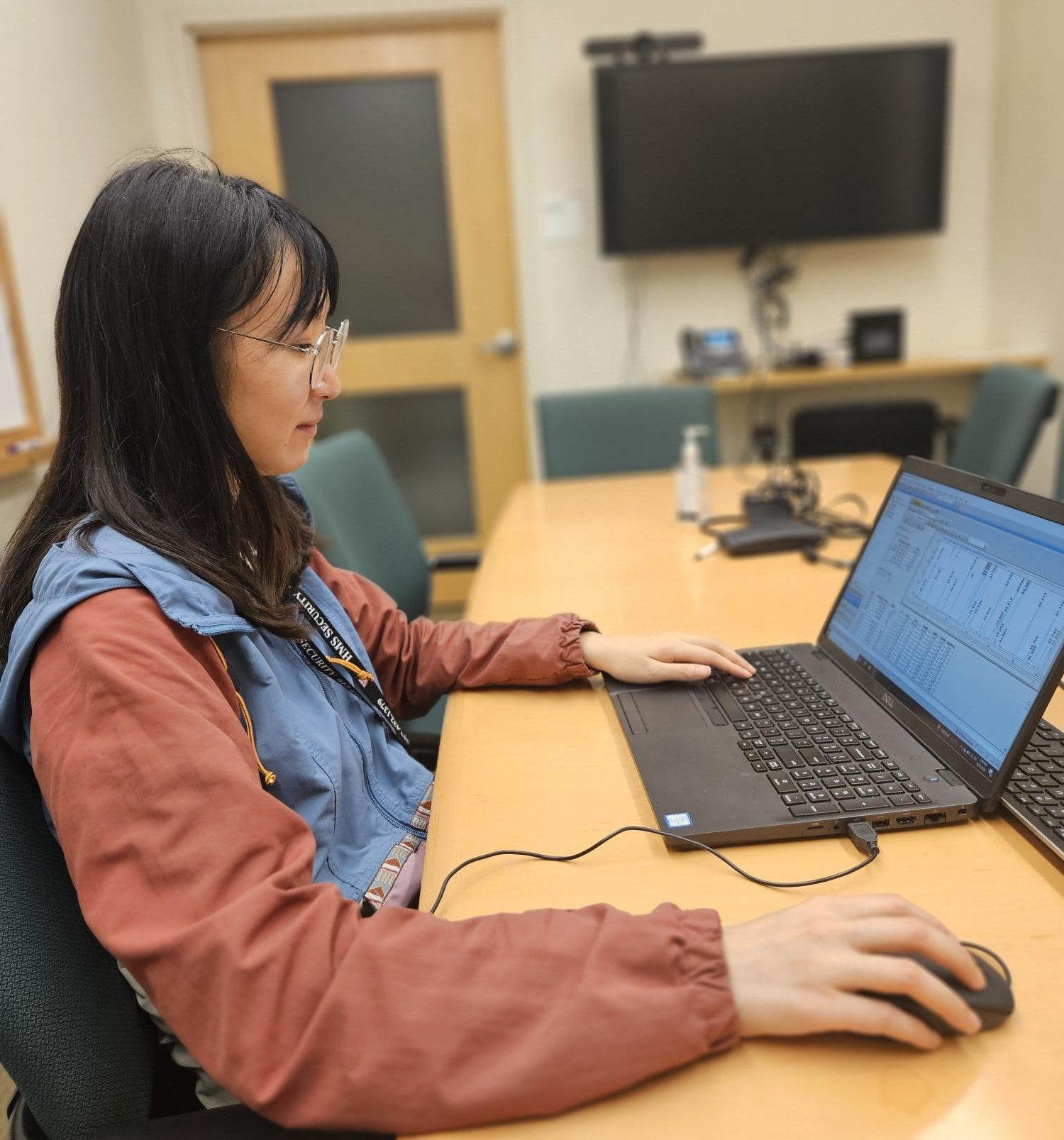 A lab member computing data