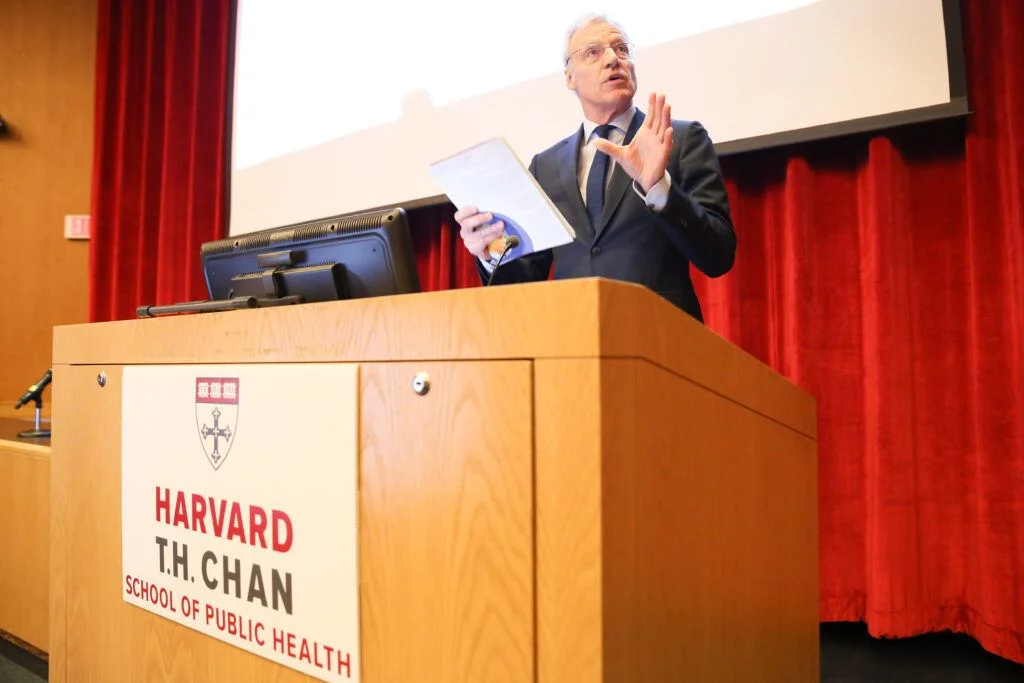 Hofman speaking at the 2019 Cutter Symposium.