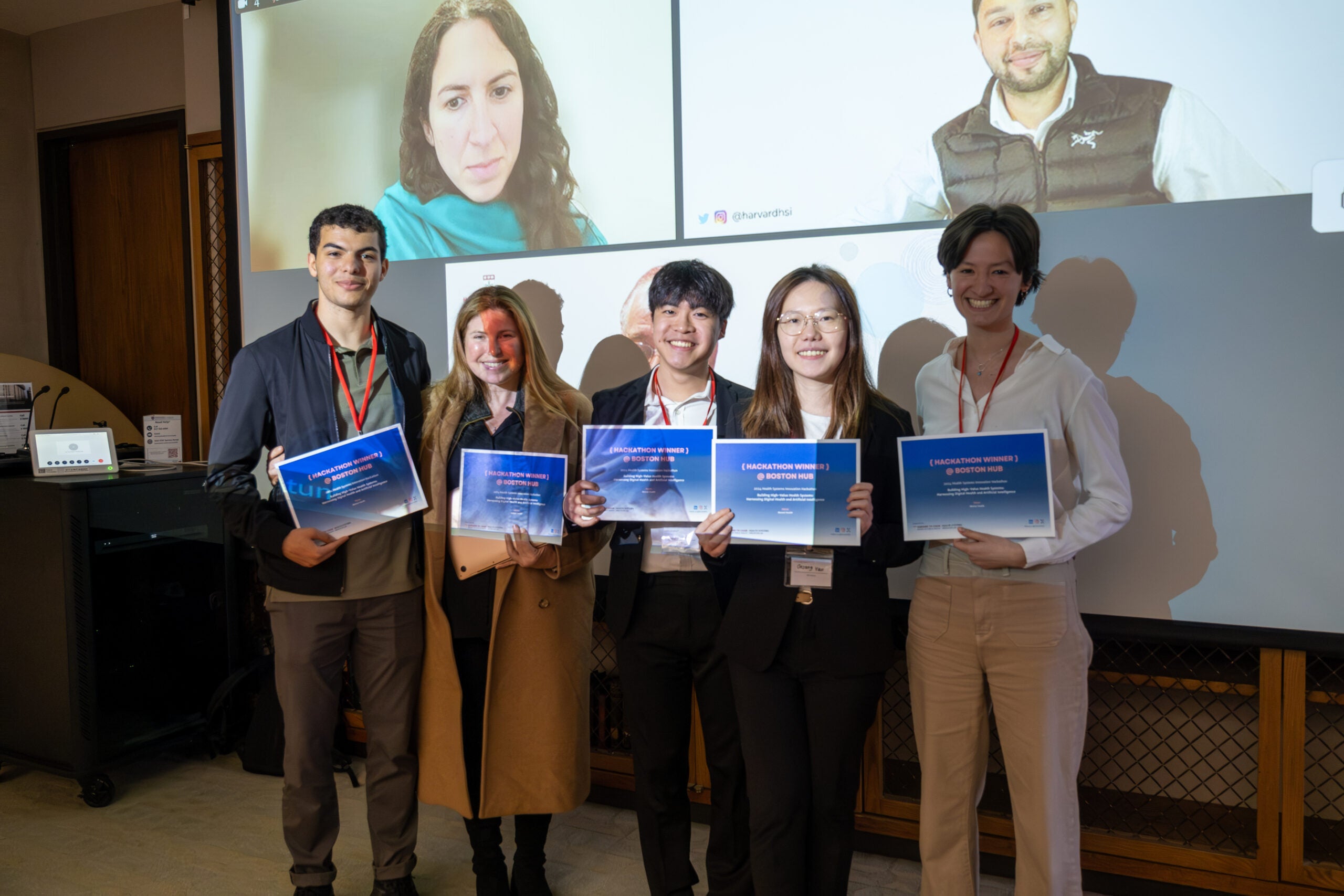 HSIL students displaying certificates they won