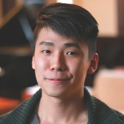 Headshot of Kevin Ma with an academic background.