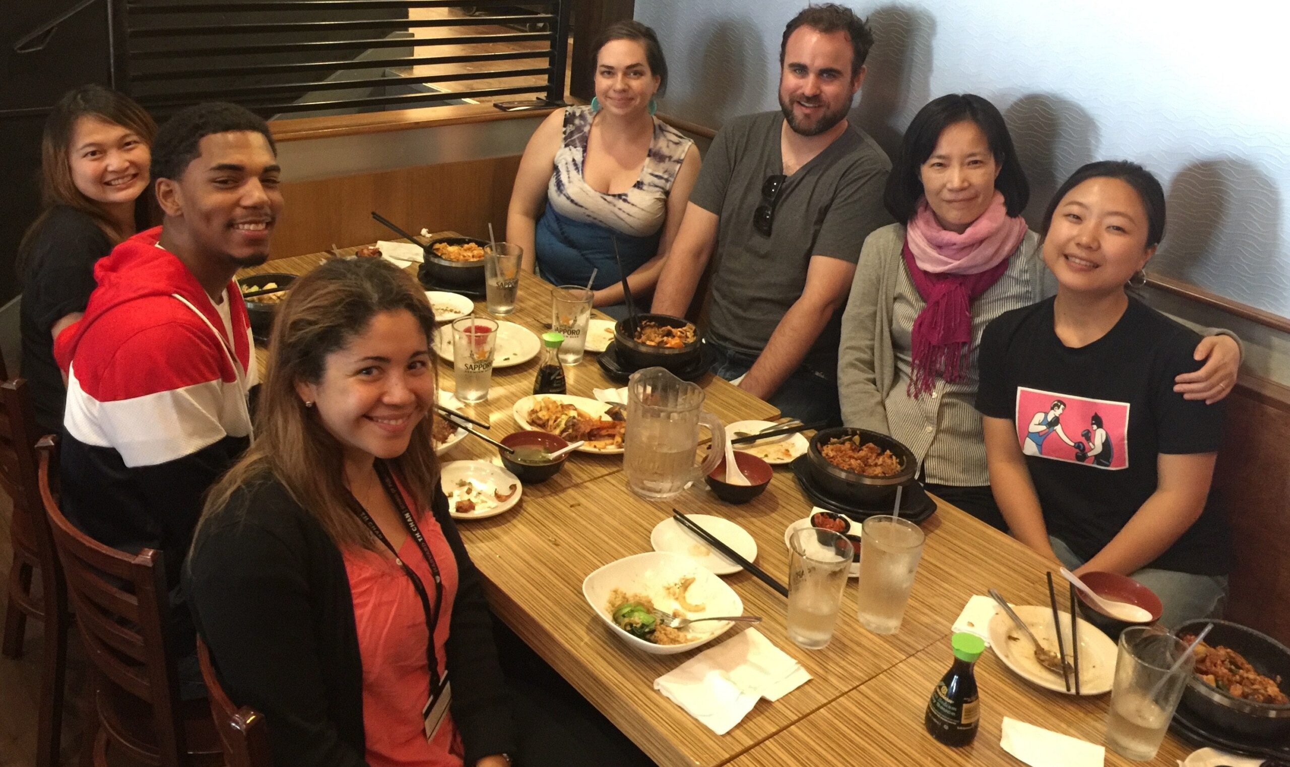 A group of people at a restaurant table.