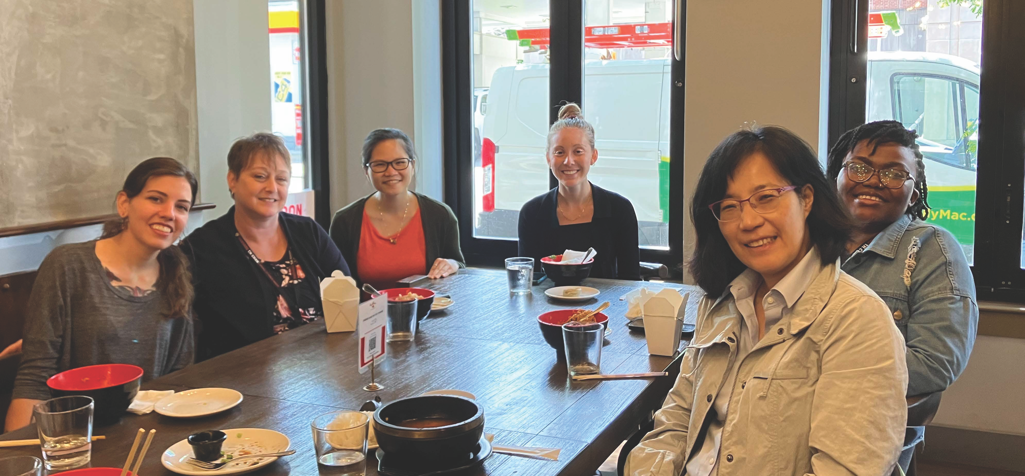 A group of people at a restaurant.