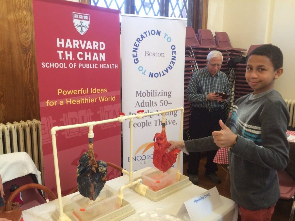 Young boy at community science exhibit