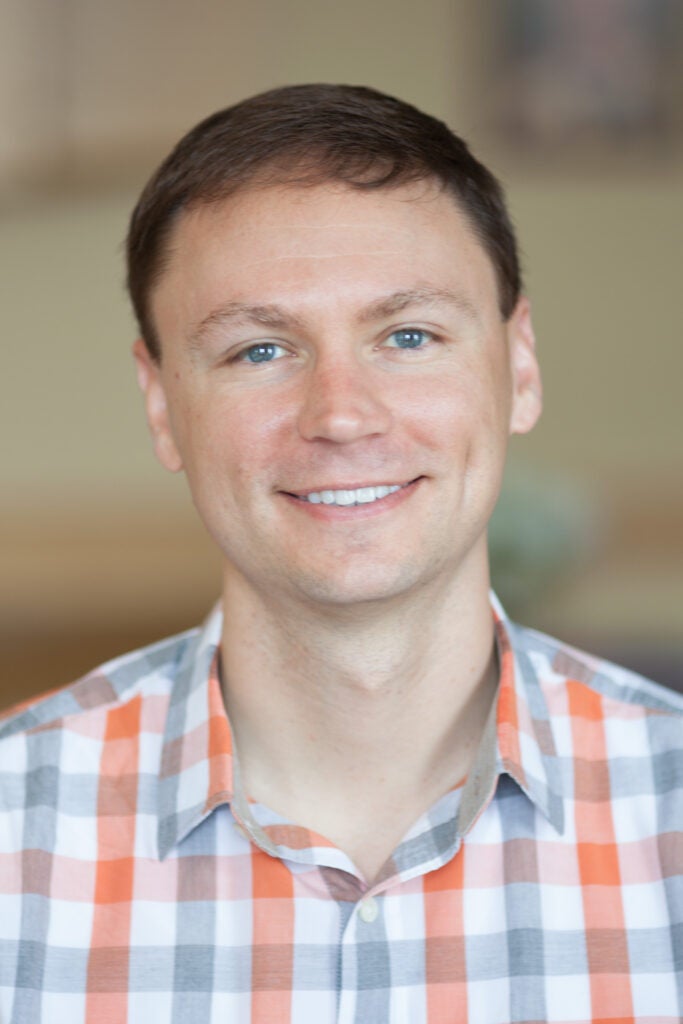 a headshot of Dr. Scott Delaney