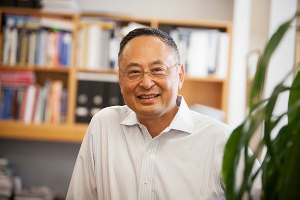 Harvard University Alumni Gerald Chan is pictured in the Kresge Building at Harvard School of Public Health. Stephanie Mitchell/Harvard Staff Photographer