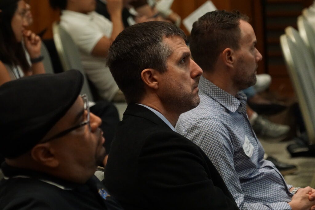 Department Alumni listen in during 20th Anniversary Symposium. 