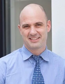 Headshot of faculty member Giuseppe Raviola