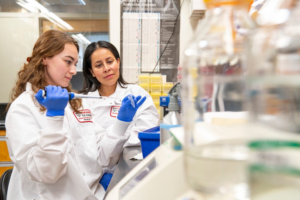 Meghan MacDonald (left) with Rosa Perez (right) in the lab