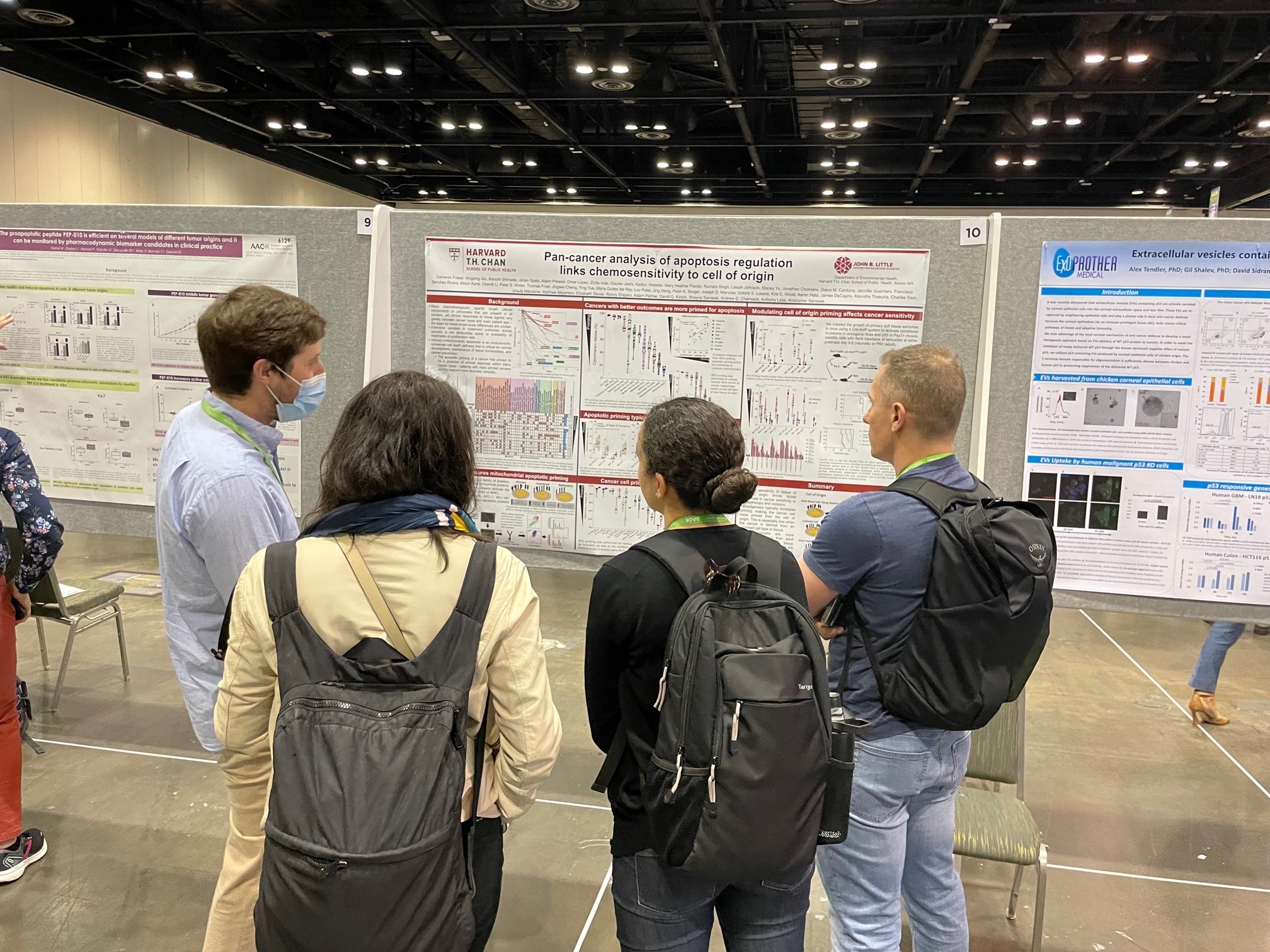 Cam presenting his poster at AACR 2023