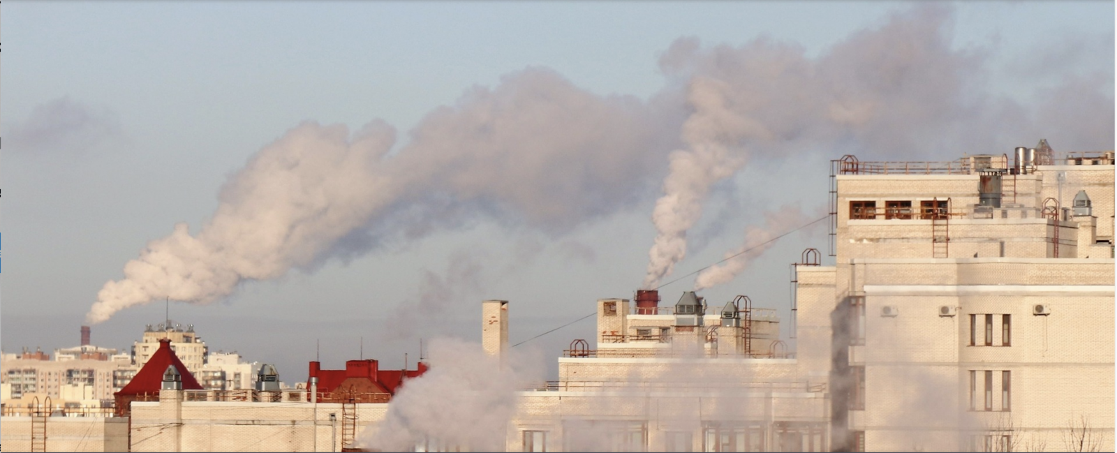 Smoke billowing from chimneys