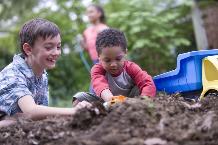 Boys playing in dirt