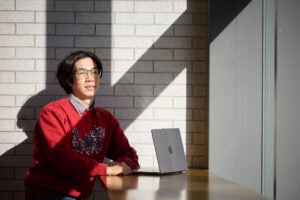 Environmental portrait of Fenglei Wang on the Harvard TH Chan School Public Health Campus.