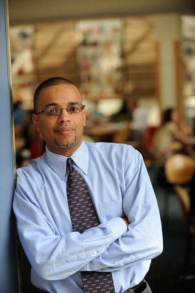 Headshot of speaker Victor Ortiz. He is wearing glasses and crossing his arms