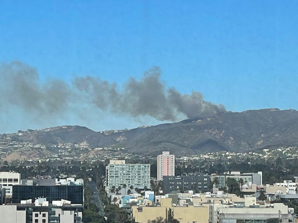 Dark smoke billowing from the hills above Santa Monica.