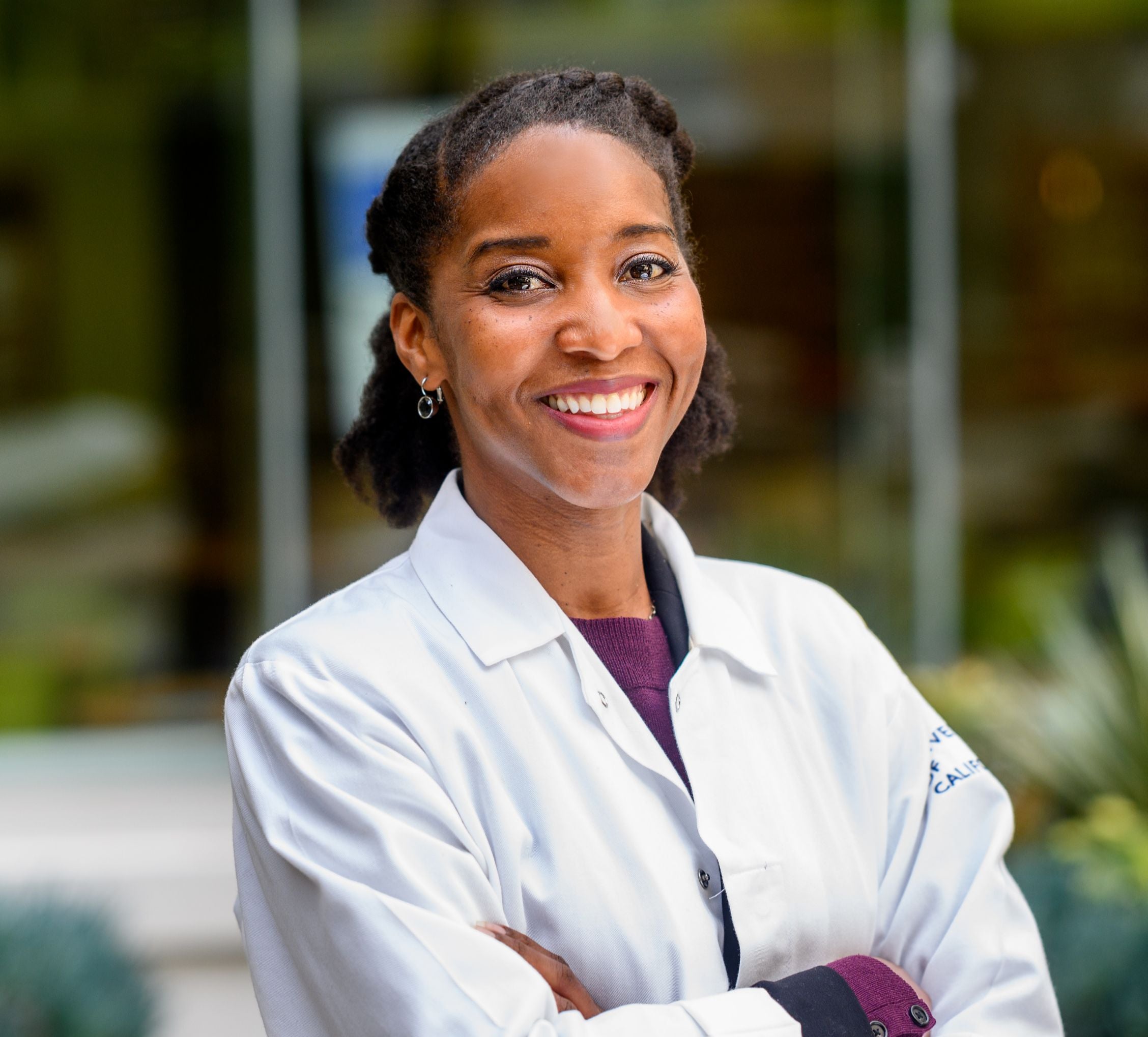 Catera Wilder, posing with a lab coat