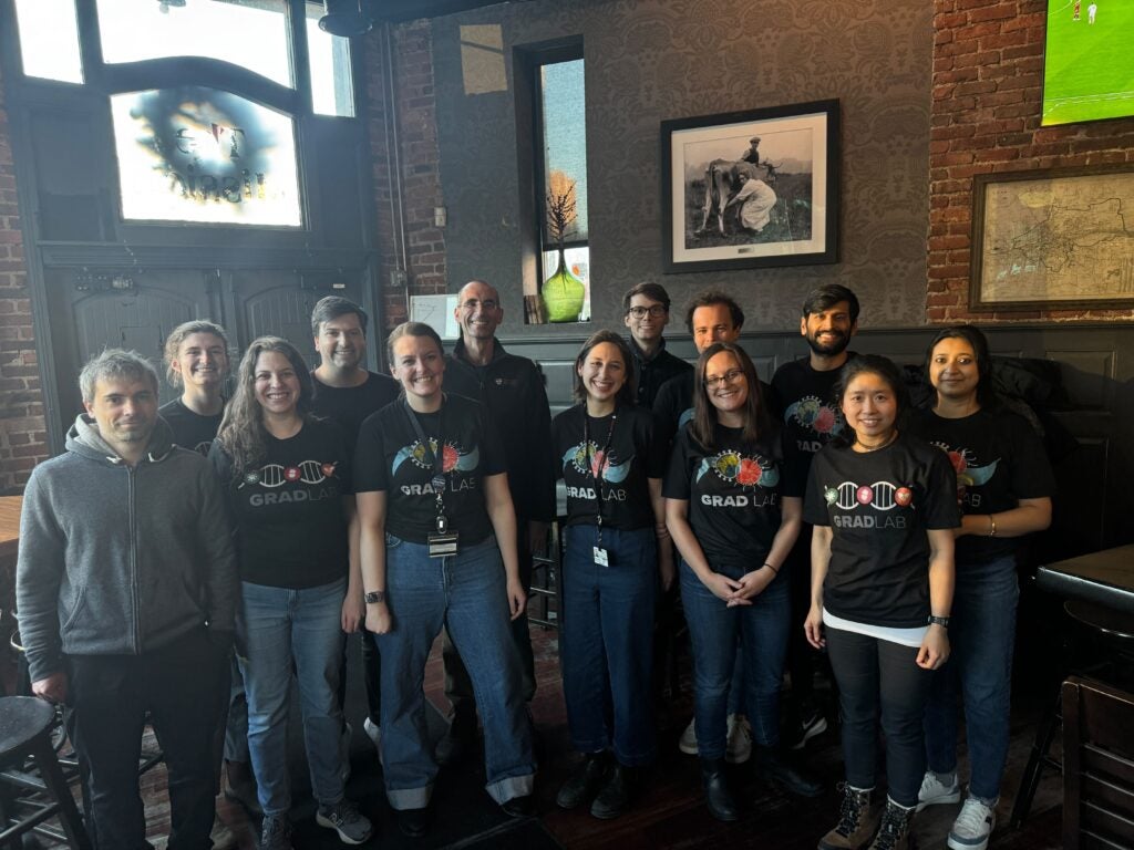 Grad Lab members at "The Mission" all wearing t-shirts with the "Grad Lab logo" celebrating Prof. Grad tenure appointment.