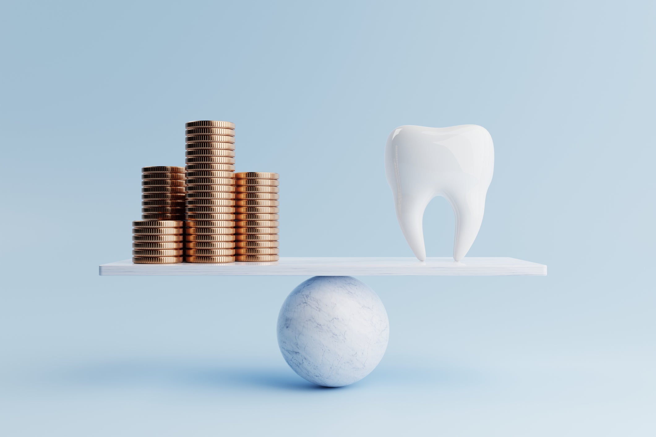 Tooth and golden coins on balancing scale on blue background. Health care and financial concept.