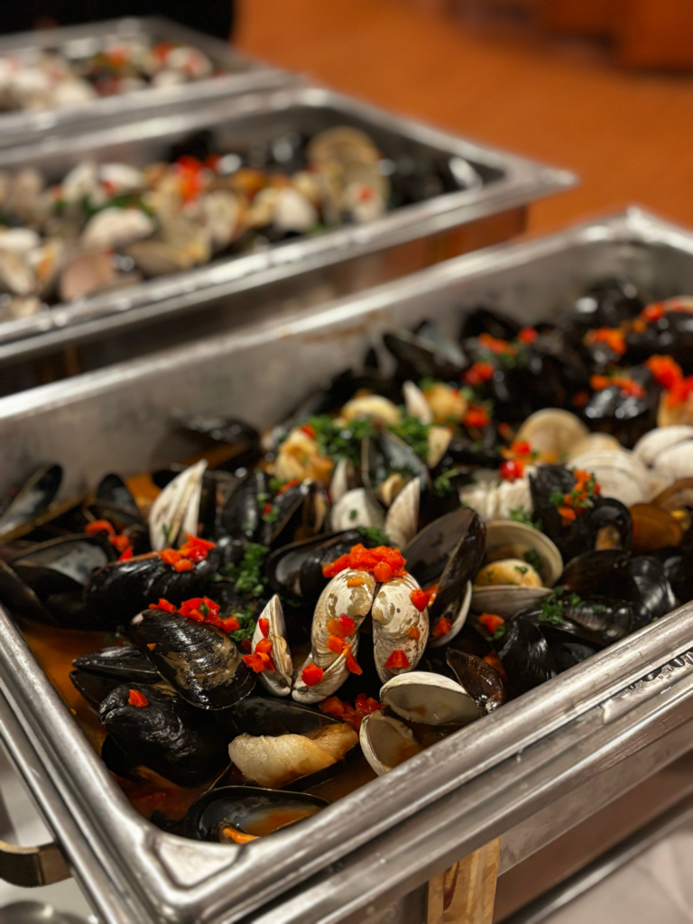 Mussels and clams in a serving dish.