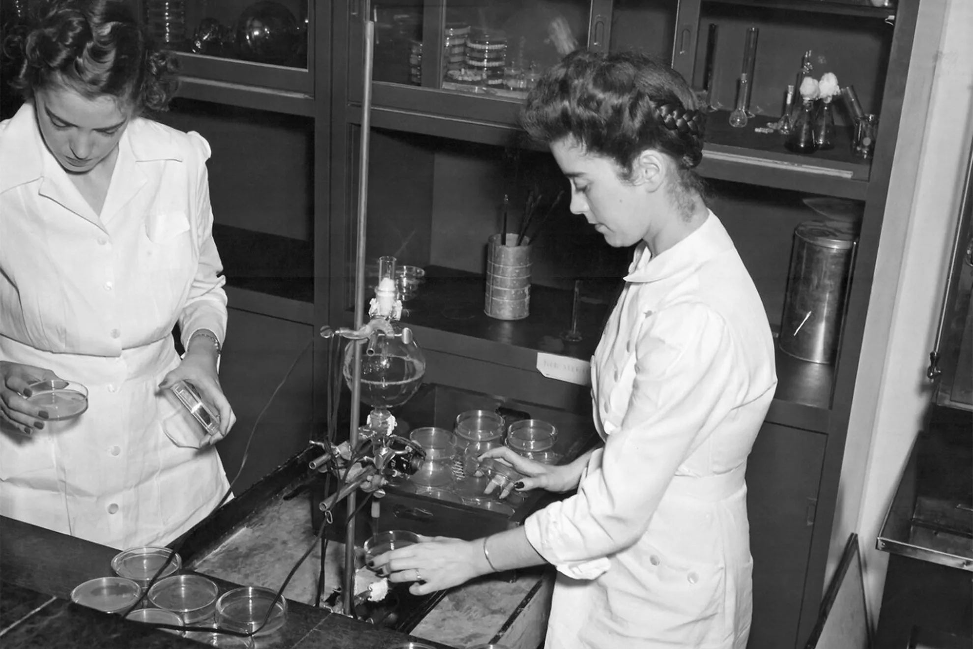 Mary Hunt believed to be on the left with a fellow worker inside Peoria's USDA Northern Regional Research Laboratory ca. 1943