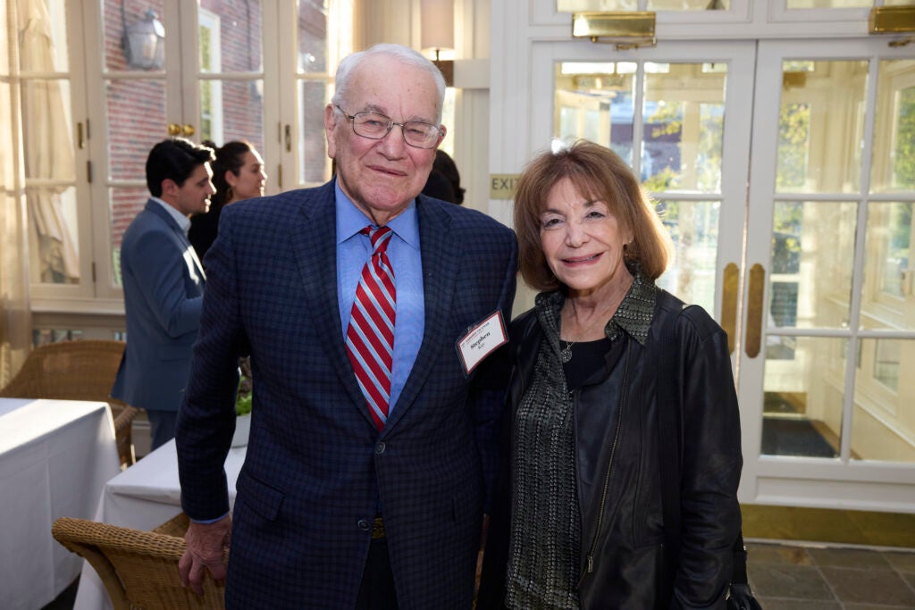 Two guests pose together. 