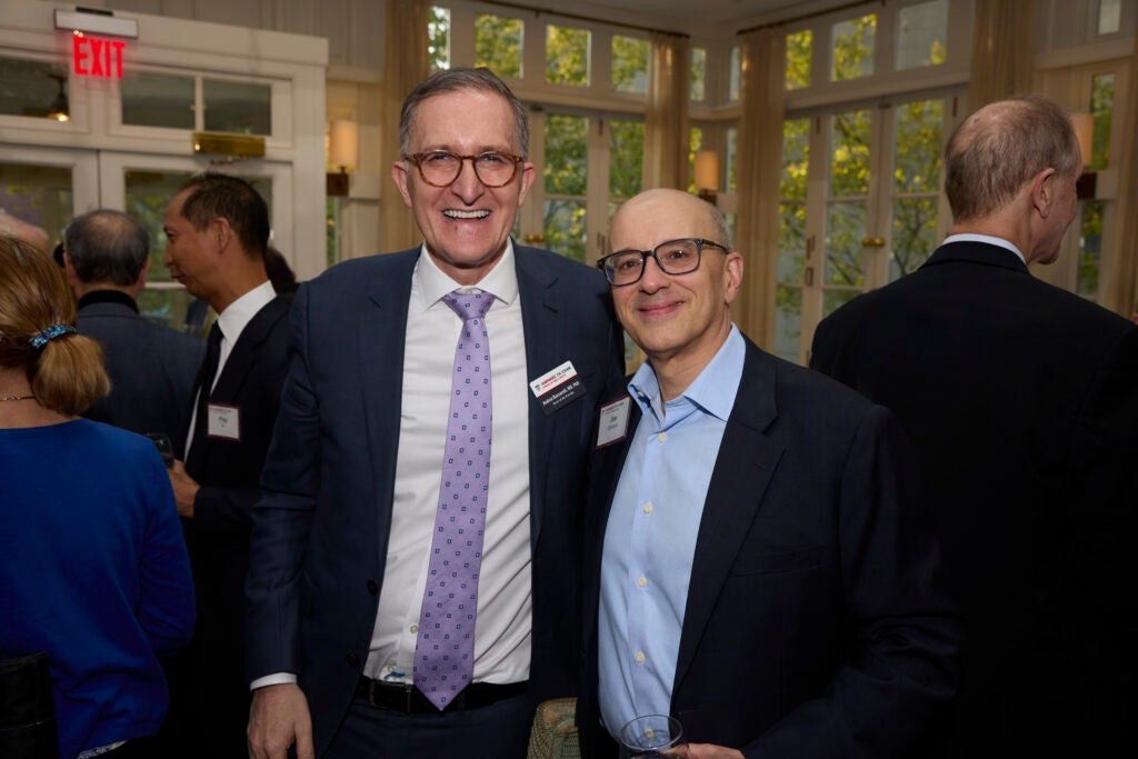 Dean Bacarelli poses with a guest. 