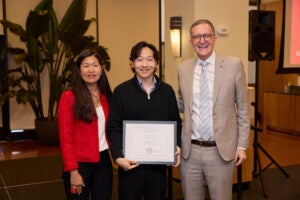 Teaching fellow award winner Daniel Xu with Deans Jane Kim and Andrea Baccarelli