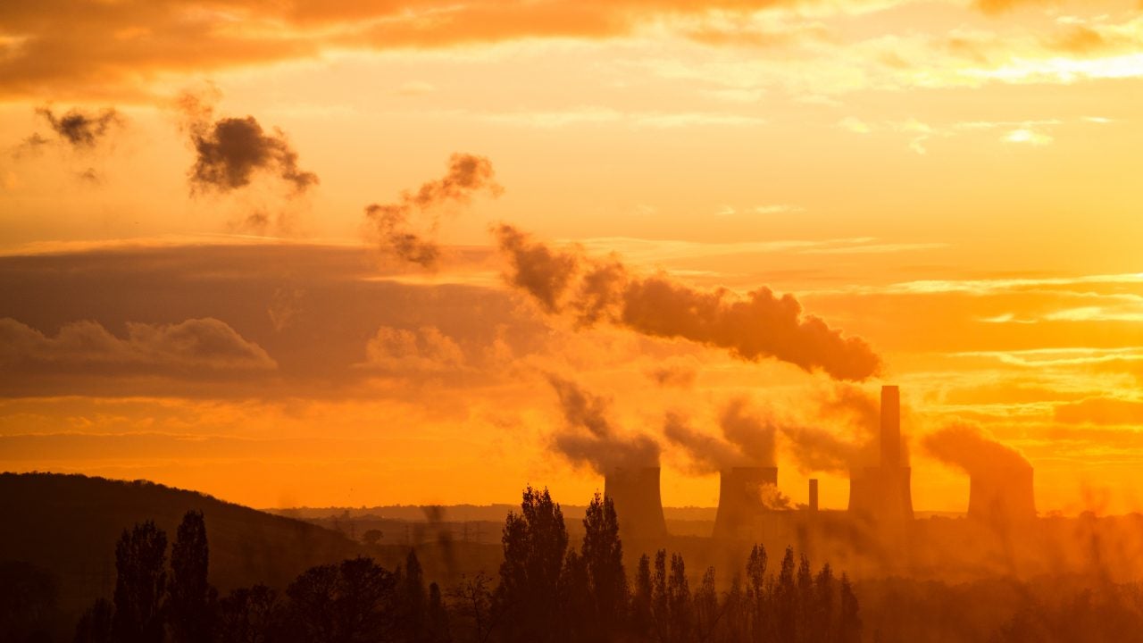 Polluting power plant in the sunset