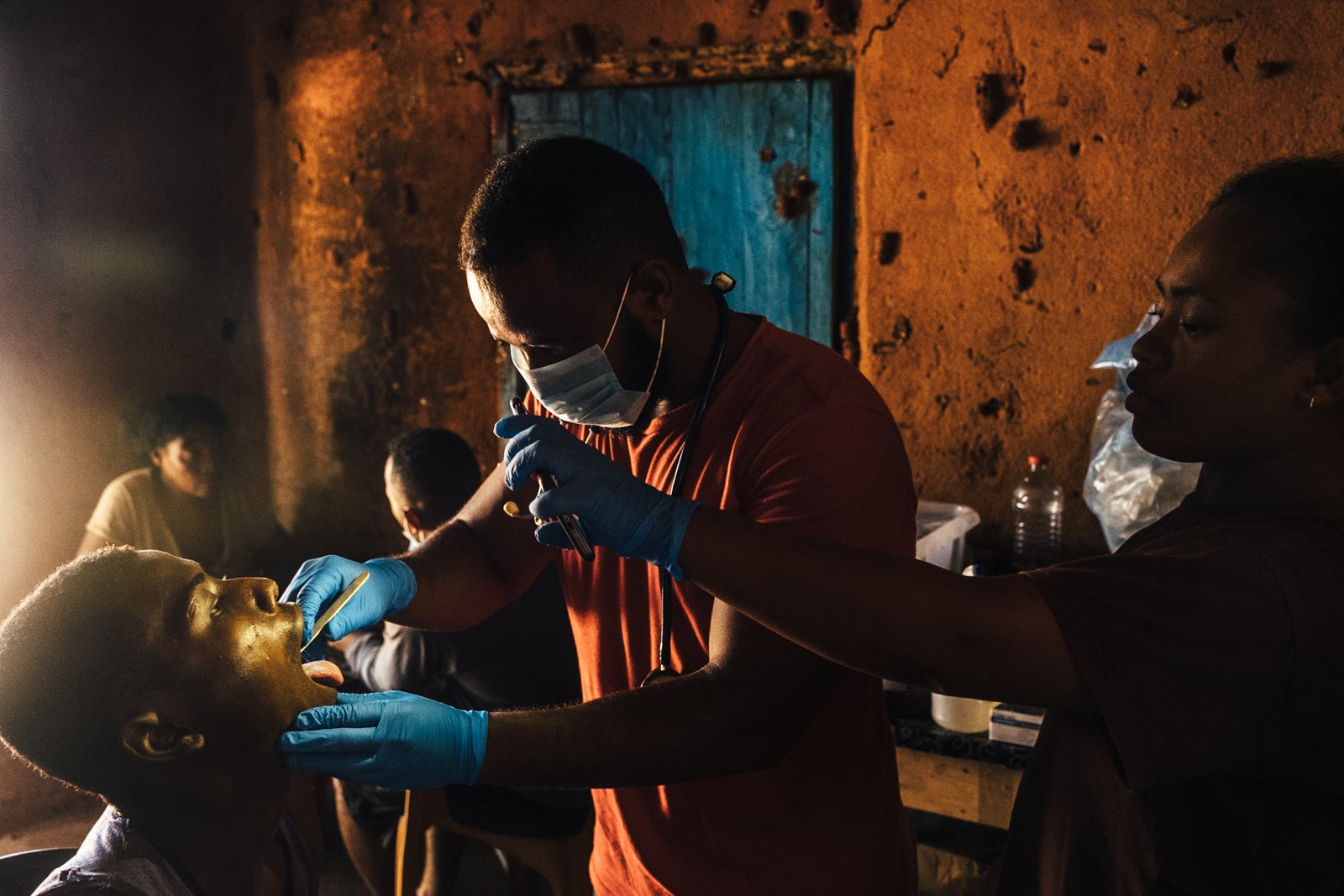 patient being checked at a clinic in Madagascar