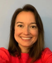Headshot of Sara Pellegrom, smiling
