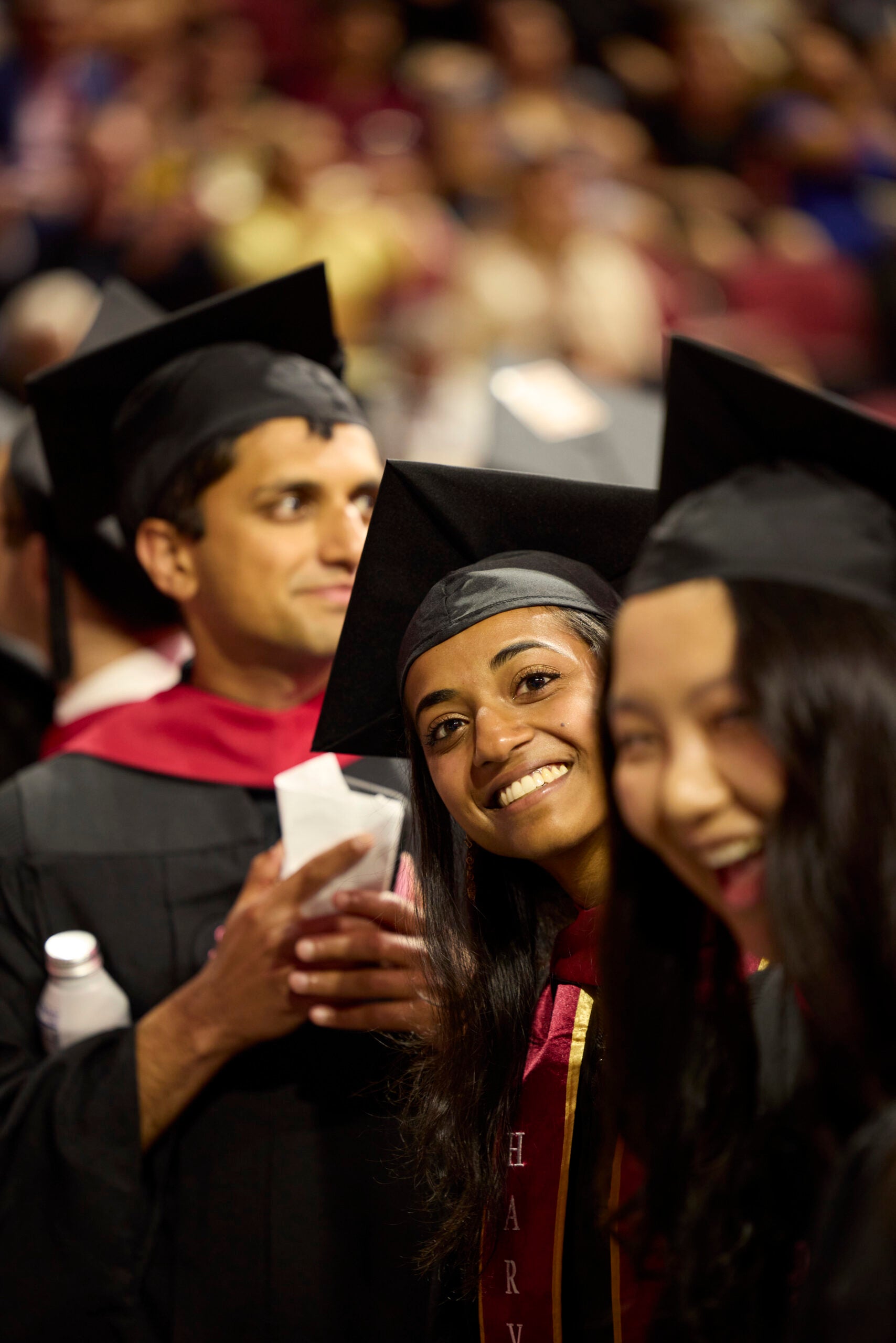 Smiling students at graduation