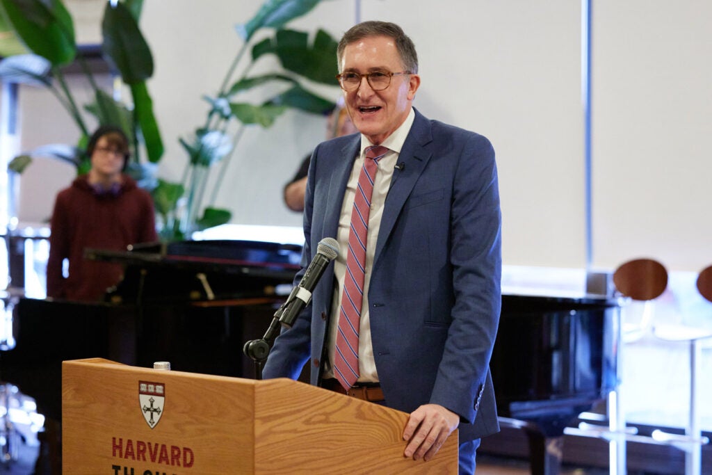 Dean Baccerelli speaking at a podium