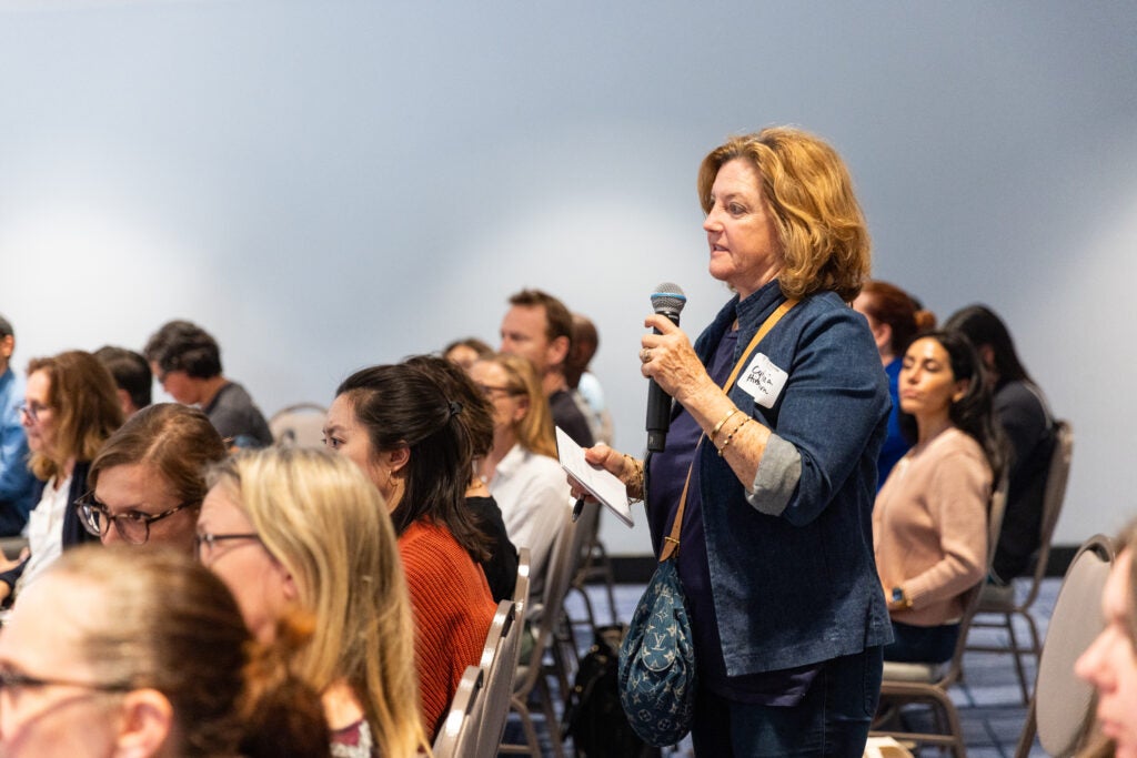 A guest at the LA wildfire event stand to ask a question. 