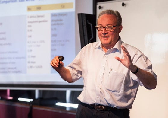 Professor Tanner leading a lecture on malaria