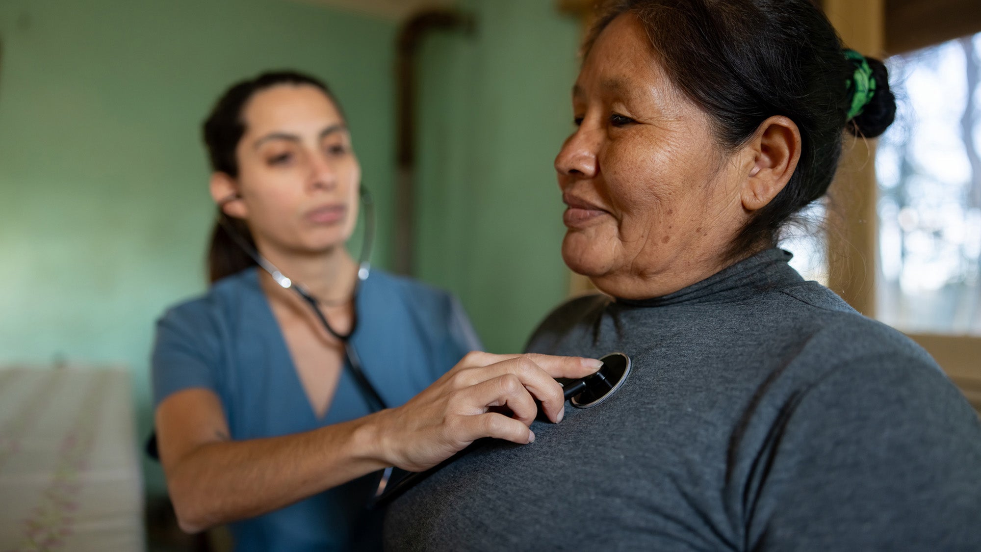 Woman in Latin America getting a health exam