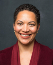 Headshot of Mary-Ann Etiebet, smiling