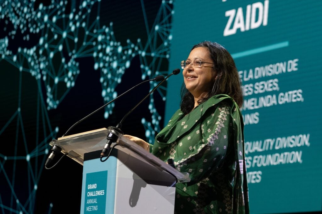 Anita Zaidi speaks at a poduim.