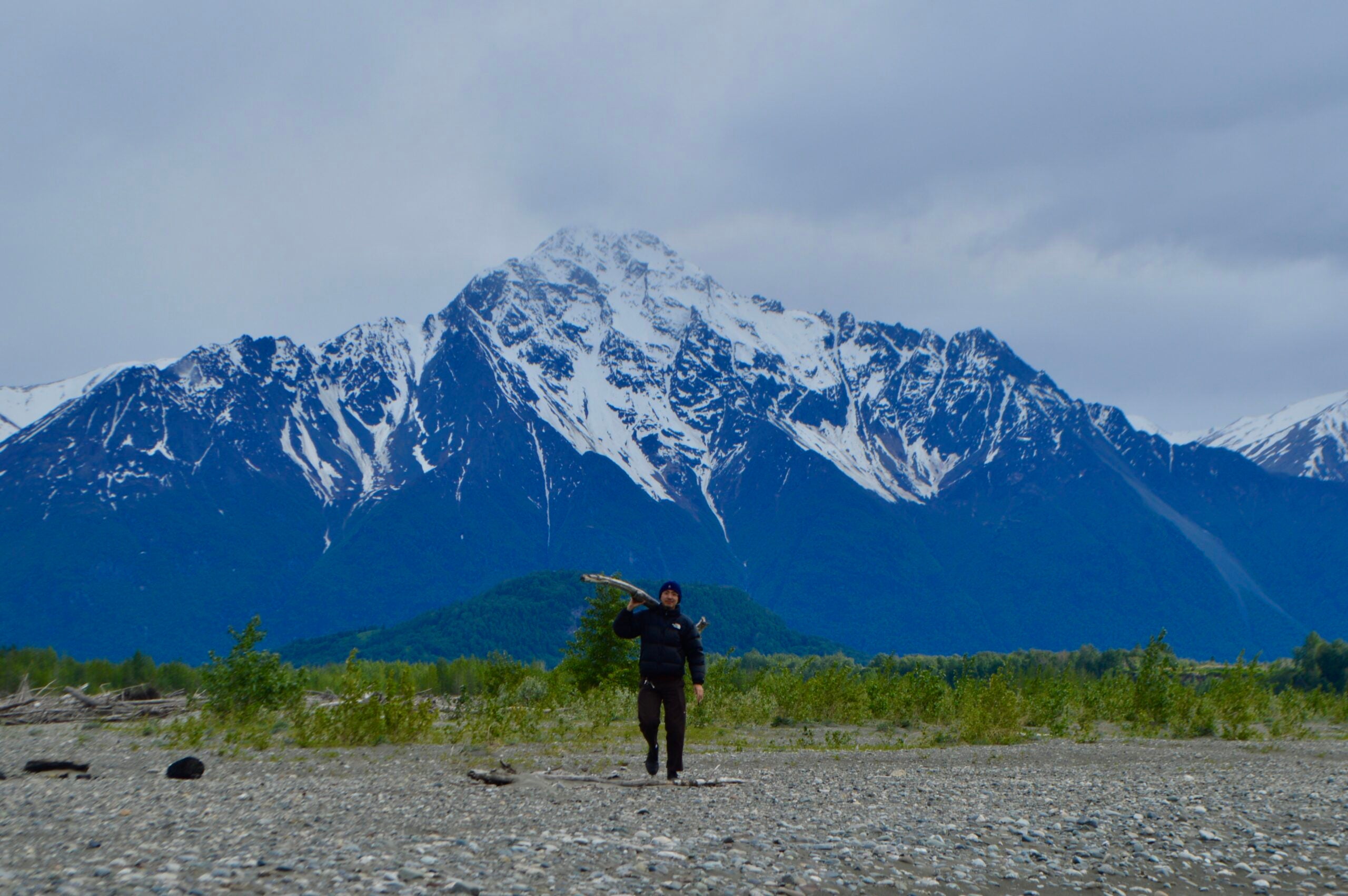 Kenzo Kimura in front of the Chugach Mountains that surround the town of Valdez, Alaska.