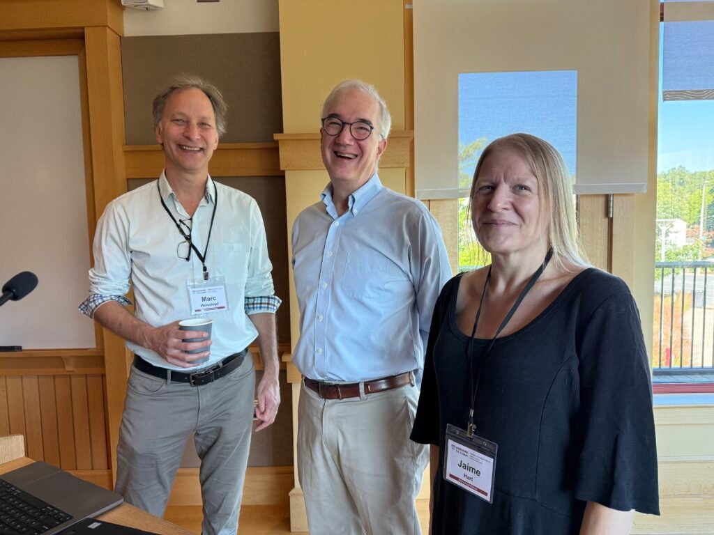 Center Director Dr. Marc Weisskopf catches up with Dr. Friedman and Pilot Project Program Director Dr. Jaime Hart.