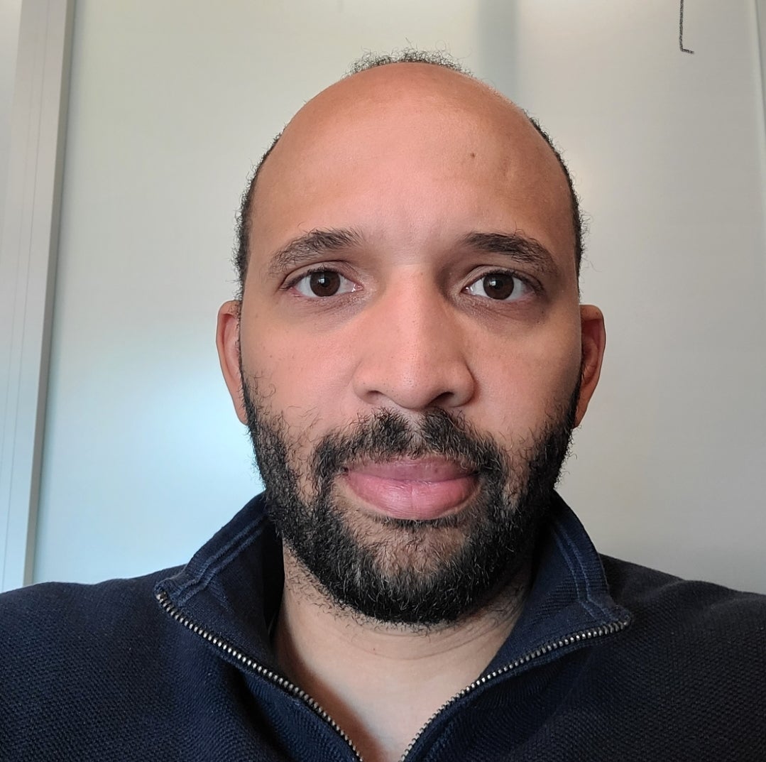 A headshot of Kemji Nwokogba