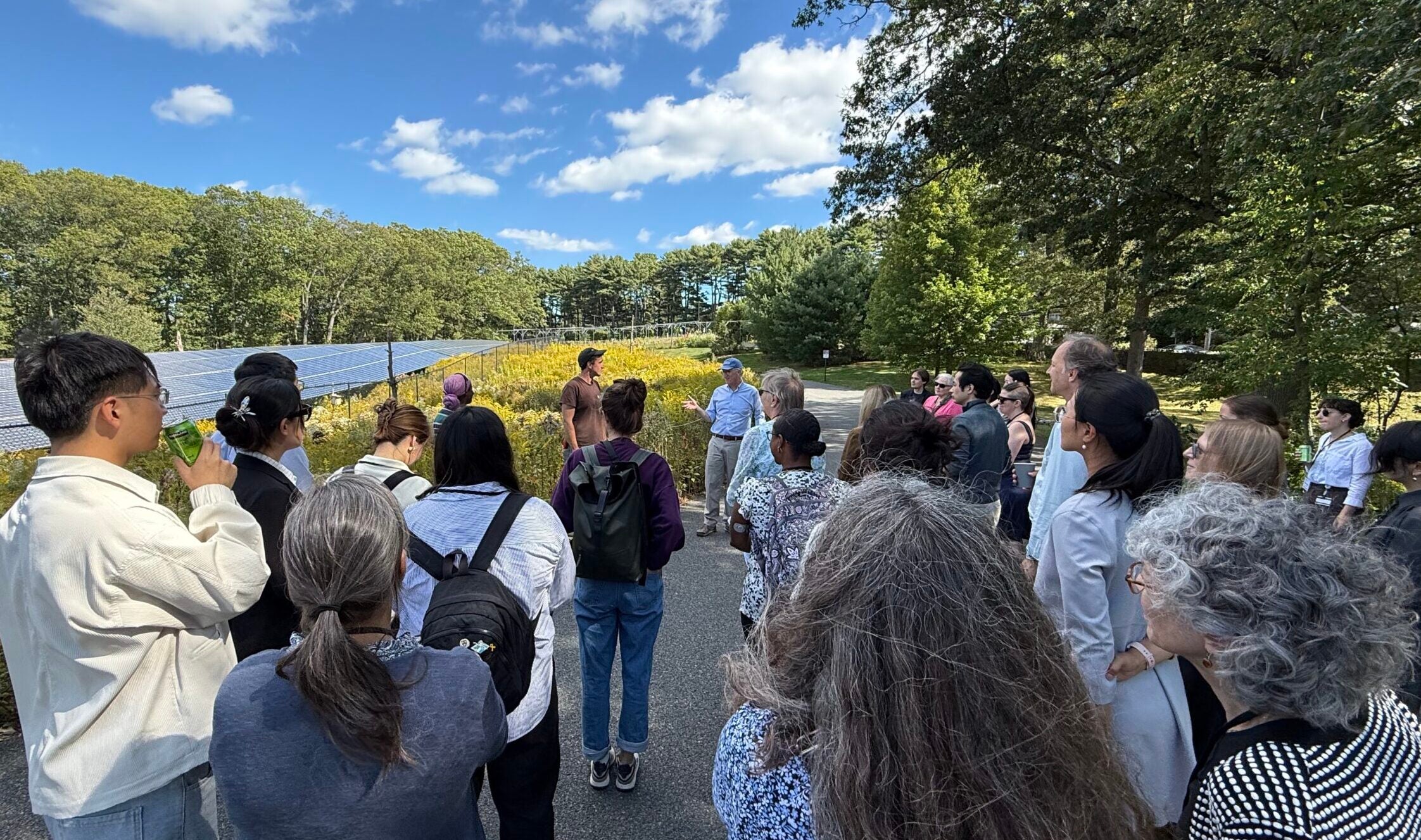 Retreat participants visit the Arnold Arboretum's solar meadow during a lunchtime walk led by Arboretum Director Dr. William (Ned) Friedman.