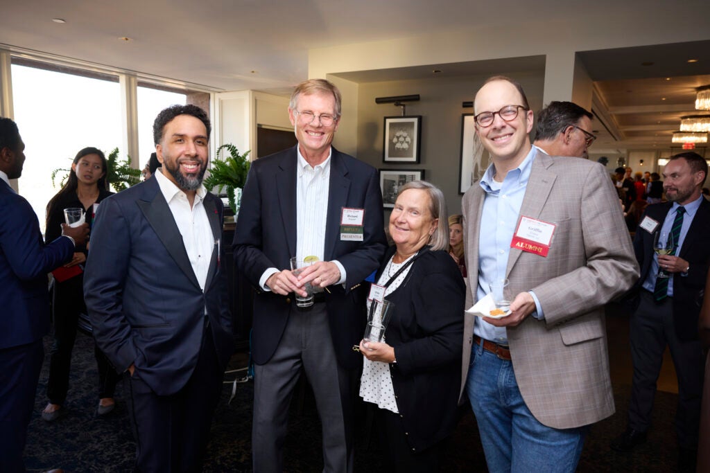 Professor Rick Siegrist poses with a group including Public Health Innovator Awardee Eugenio Fernandez . 